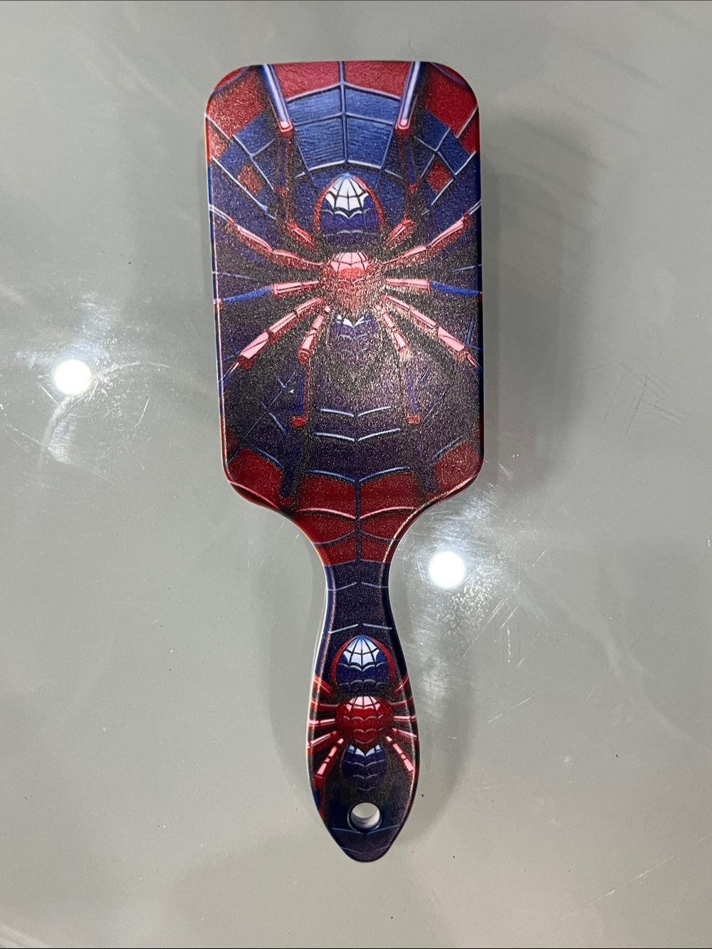 Spider Design Red and Blue Paddle Brush - Home Accents